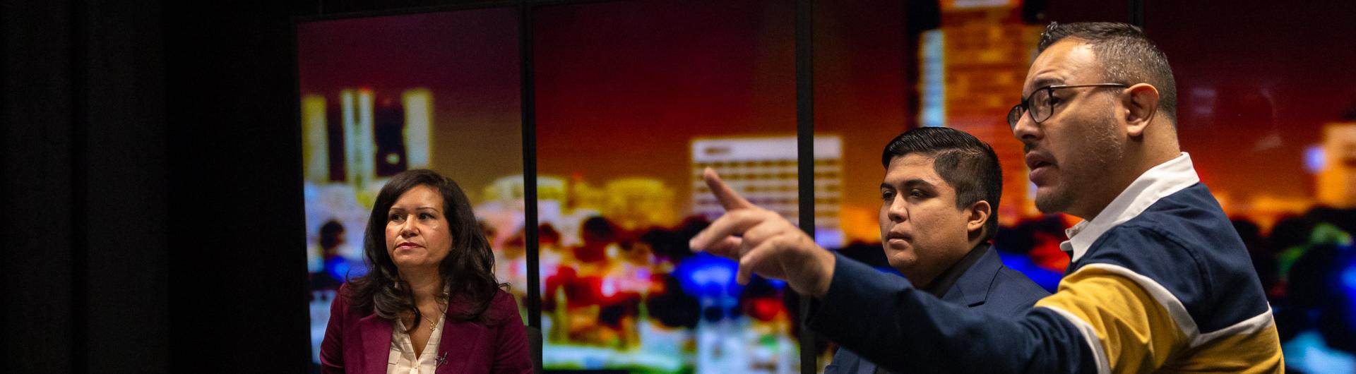 Liz Hanna, Enrique Rodriguez and Jesus Ayala at Beach TV News