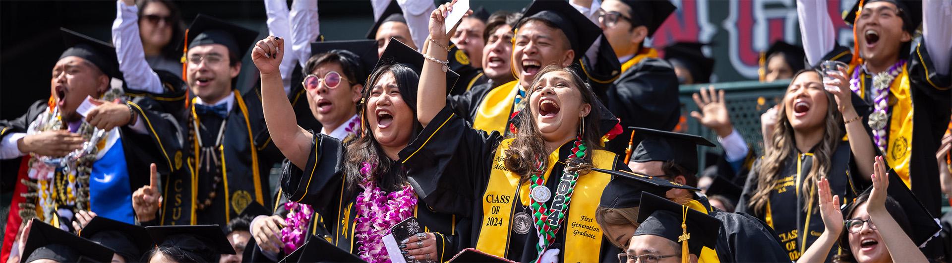 students celebrating at commencement