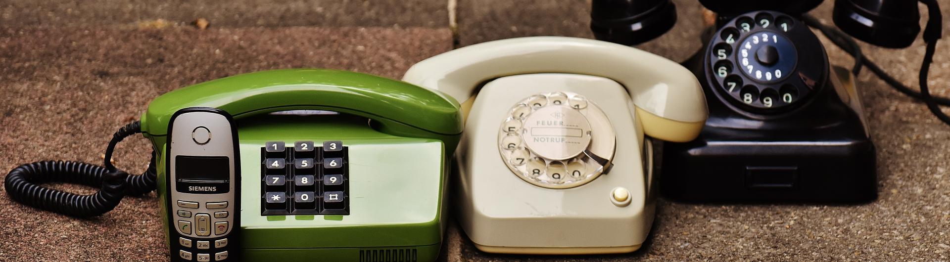 A red telephone with white background