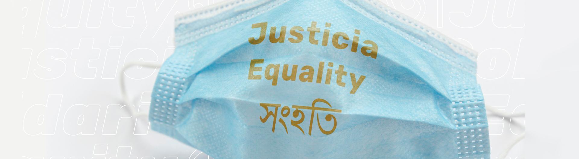Surgical face mask with the words justicia and equality printed on the front