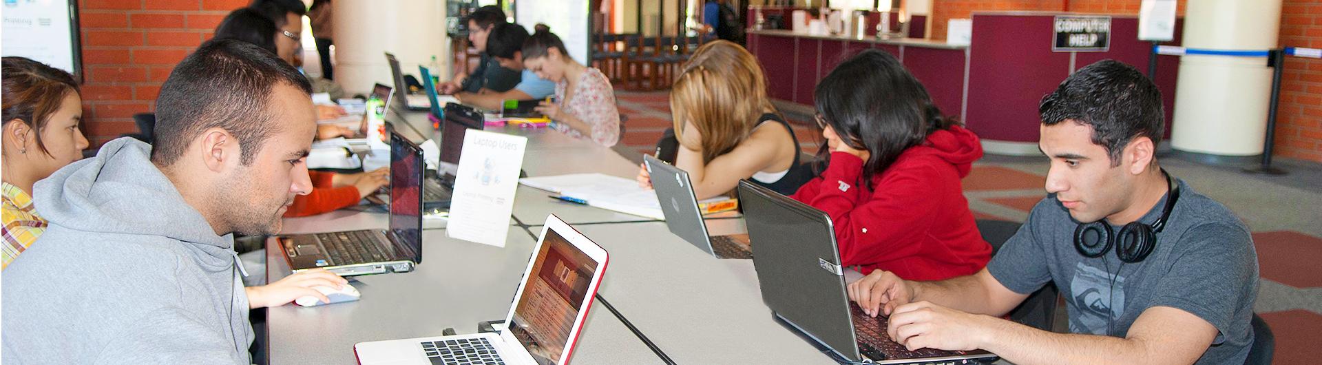 students in computer lap on laptops