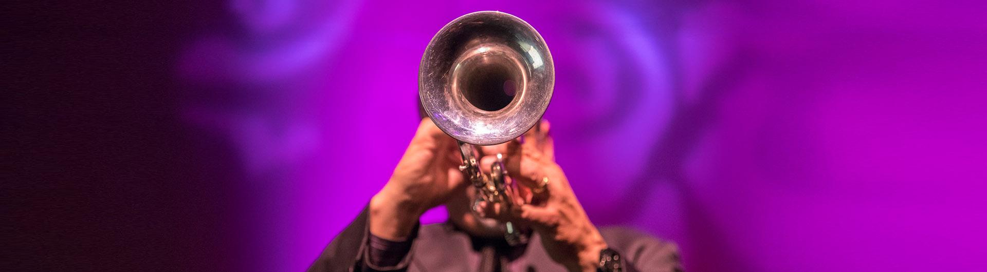 Man playing trumpet.