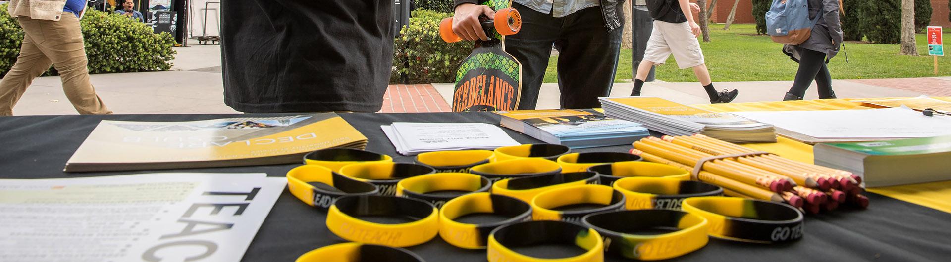 An Education Week Booth with swag on display