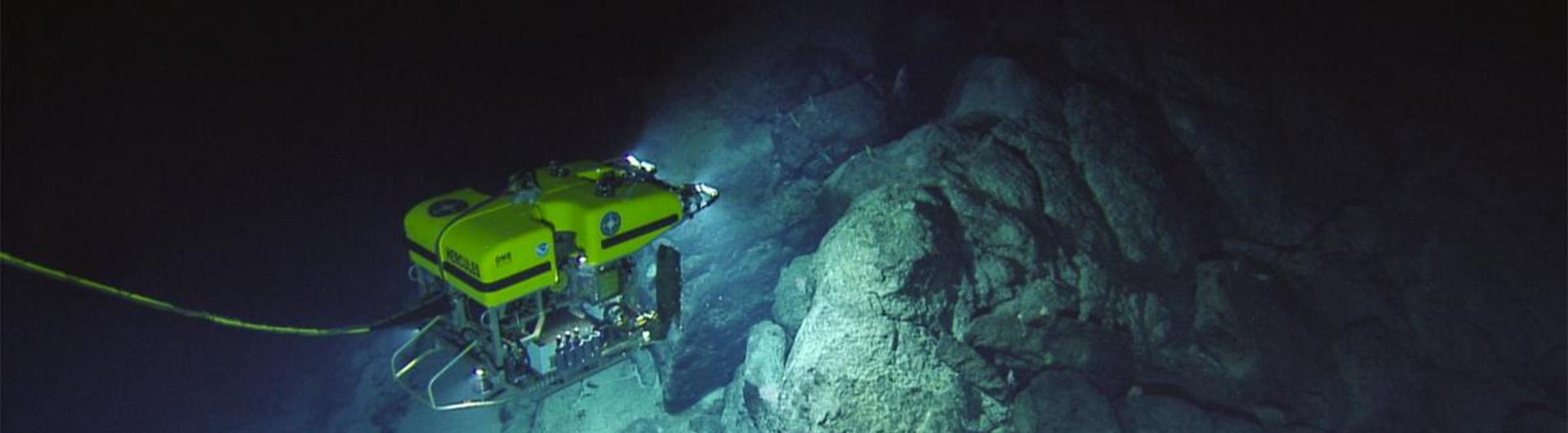 remote-operated submersible exploring underwater geologic formations