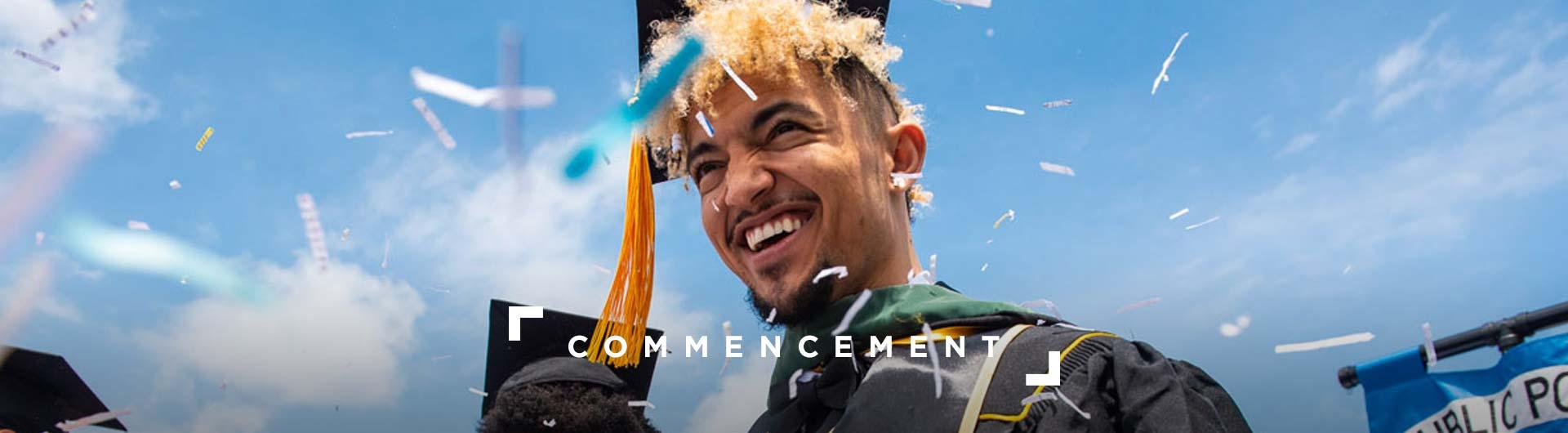 Graduate smiling in mortarboard