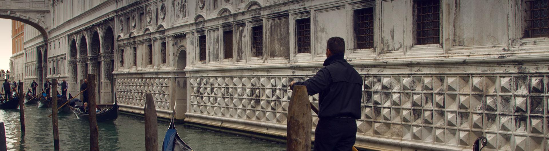 Venetian canal boat riders