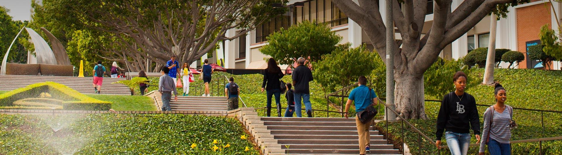 students walking up stairs near USU