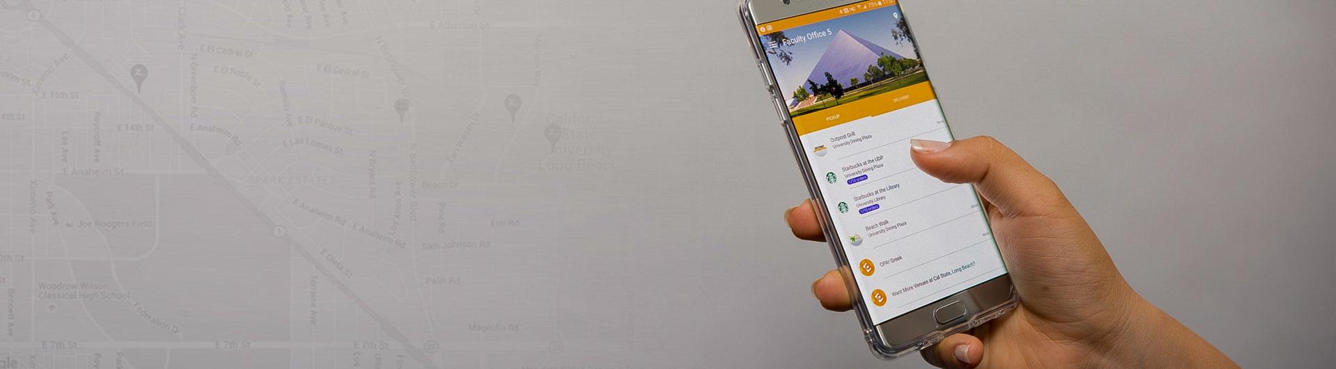 CSULB Parking App being hand held