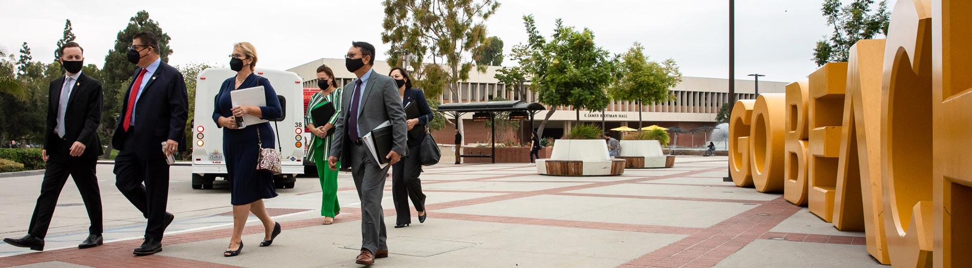 Chancellor Joseph I. Castro walks on CSULB campus