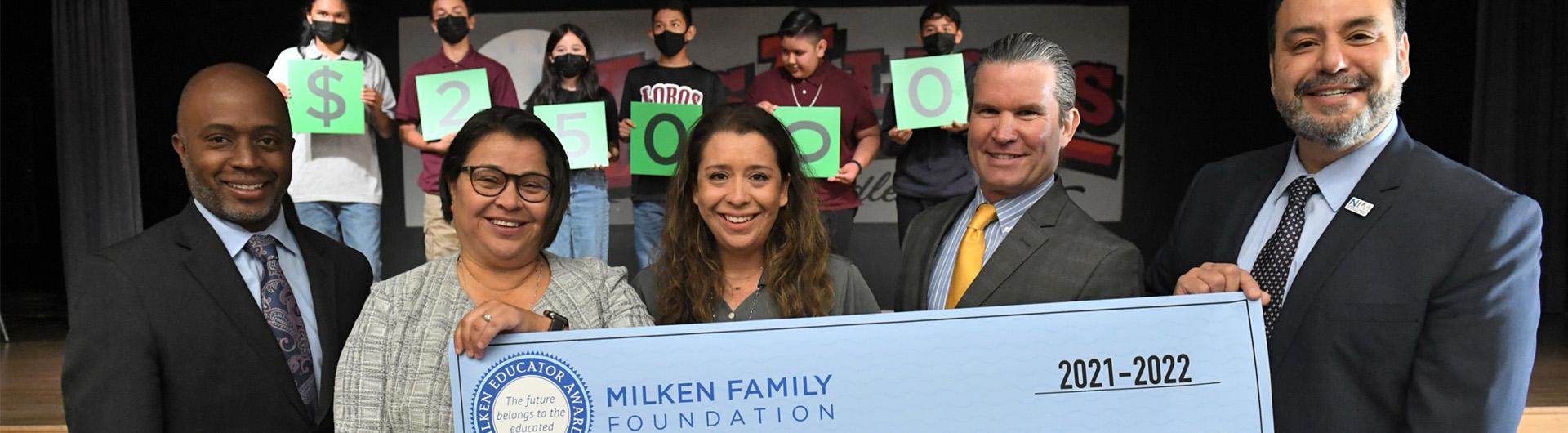 Angelica Gunderson receiving award. Photo credit Milken Family Foundation