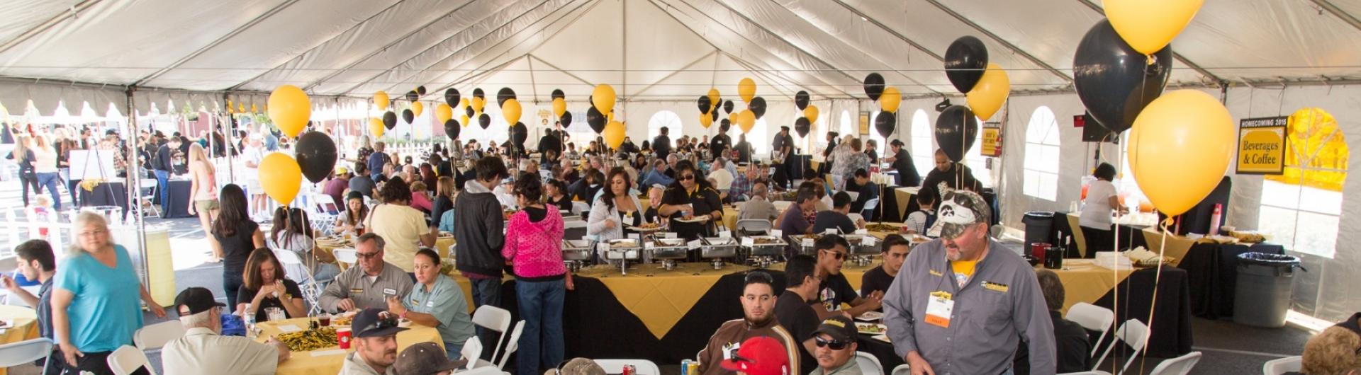 Homecoming attendees enjoy a buffet lunch