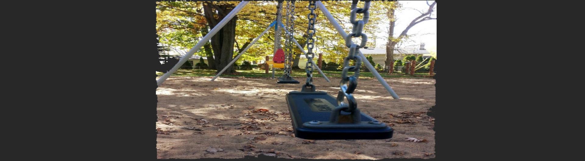 child swings Photo by Charles Rondeau