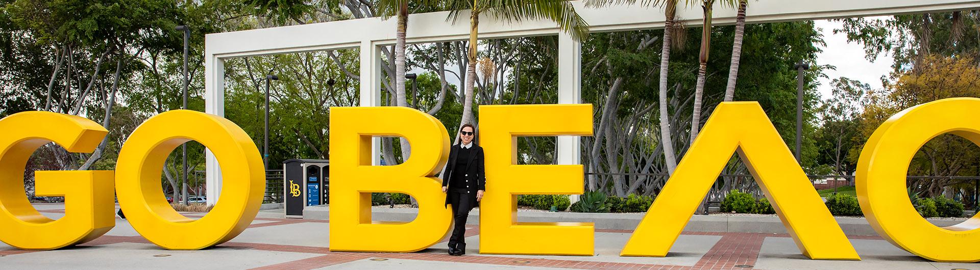 Lt. Gov. Eleni Kounalakis at Go Beach sign