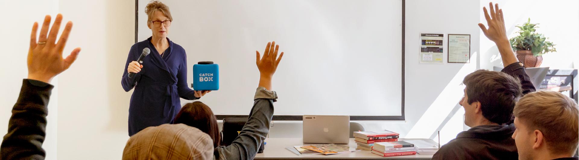 teaching with classroom equipment including a catch box mic and hand held mic