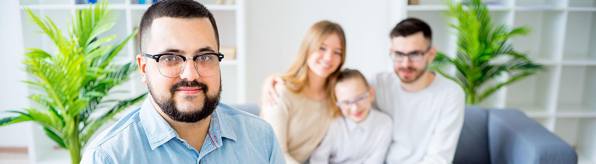 Family counselor sitting with family