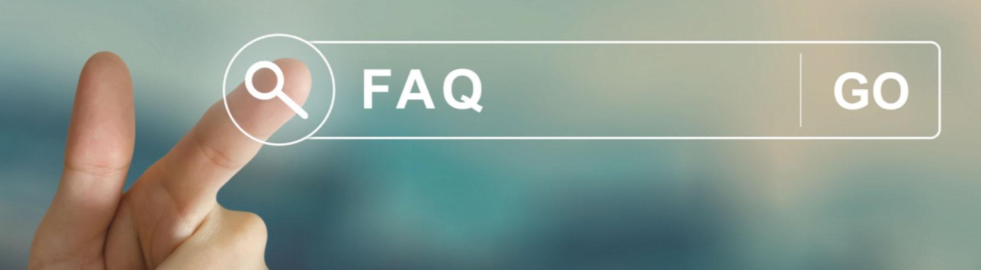 Hand pressing a search bar that says FAQ