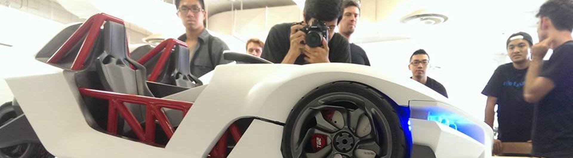 Industrial Design student's with their GOBO car prototype model