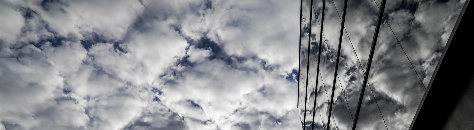 Banner PHOTO of COB Building and Clouds