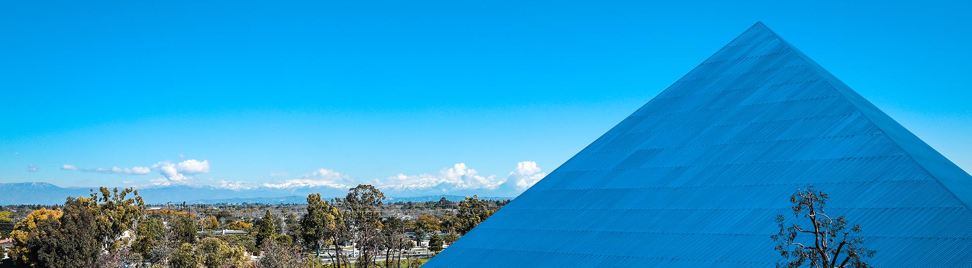 Pyramid with Mountains in the Background 