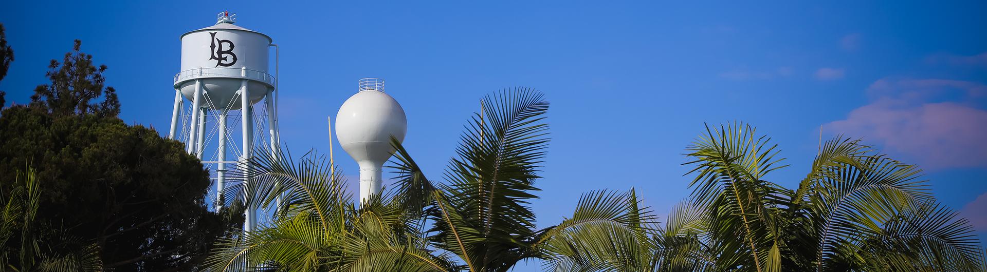 Banner PHOTO of campus includes LB Water tower and trees
