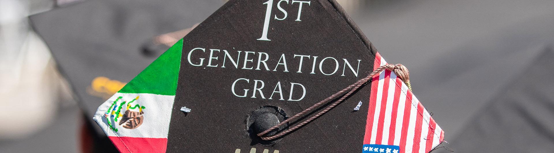 Student with motorboard message of 1st Generation Grad