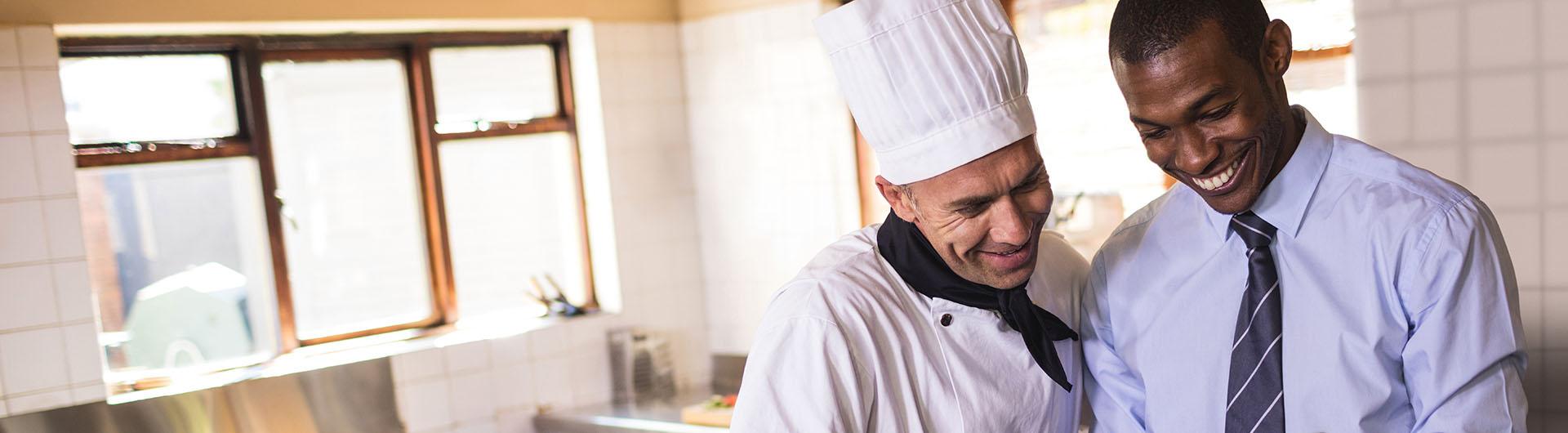 Restaurant manager working with chef