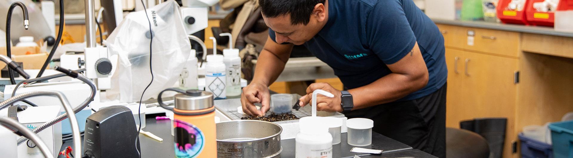 student working in lab