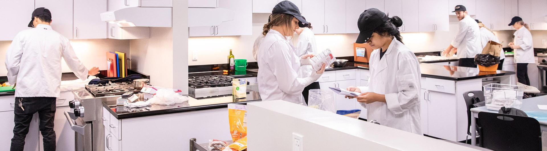 students working in kitchen