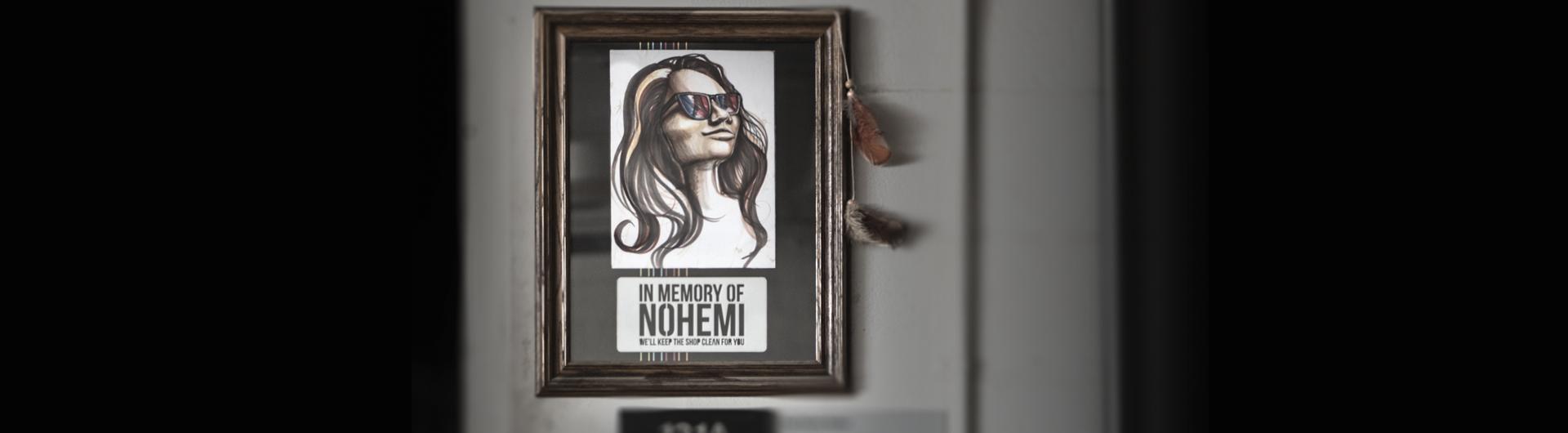A framed portrait and laser cut sign created in memory of Nohemi Gonzalez hangs in one of the shops in the Design Department. Industrial design student Alyssa Staykow drew the portrait and Gonzalez’s principal mentor and instructor Matias Ocaña designed t