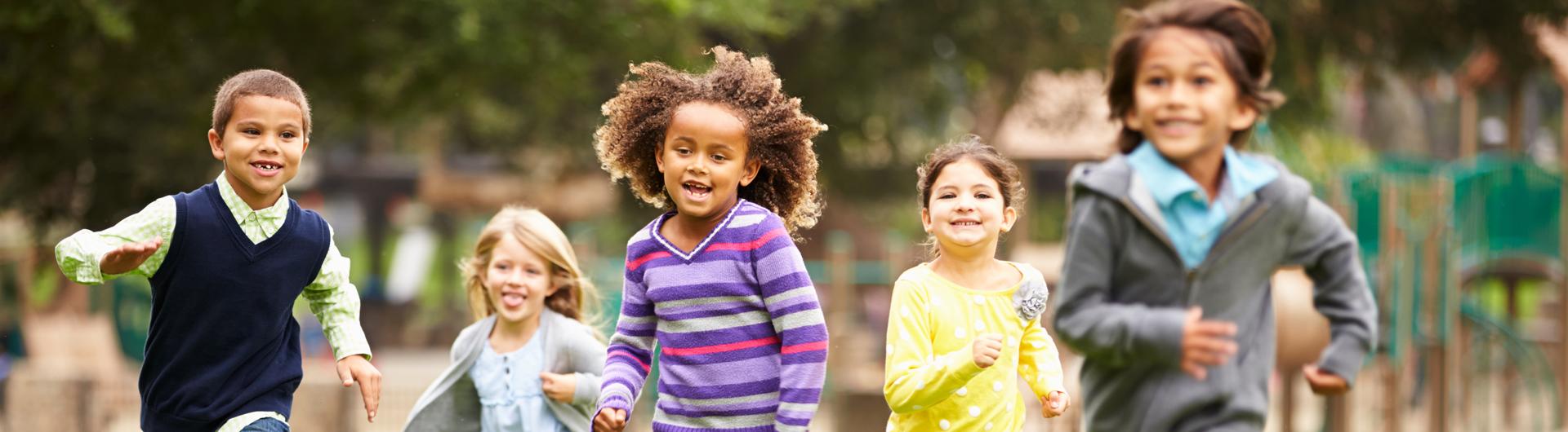 Kids running in field 