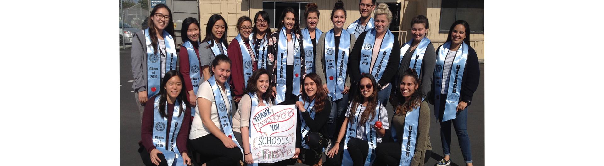     2018-19 UTEACH cohort in their UTEACH SchoolsFirst Federal Credit Union Commencement sashes