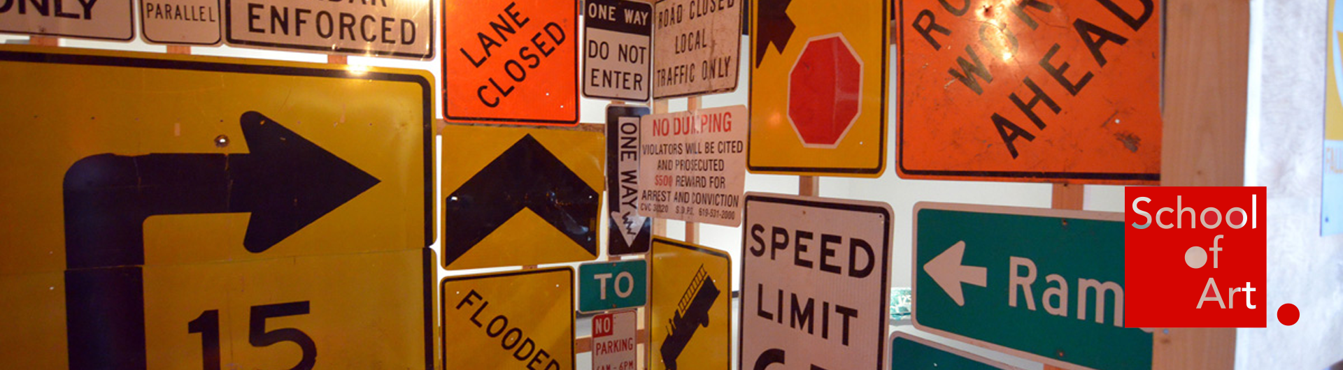 Various road signs hung closely together.