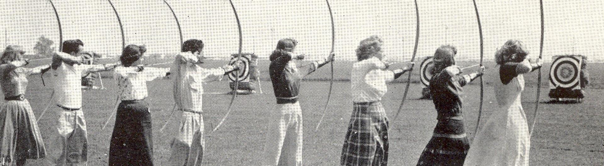 students practice archery 