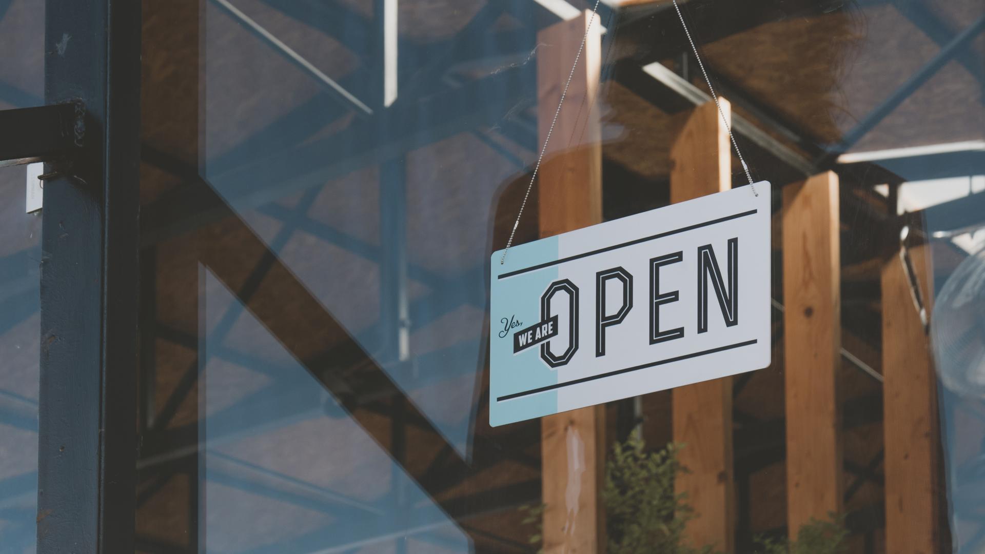 Open sign in the window of a business