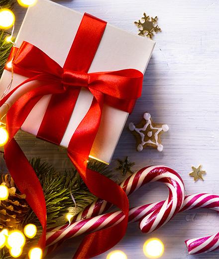 wrapped present, gingerbread, and candy canes