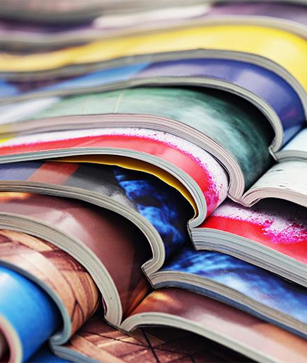 stack of open magazines