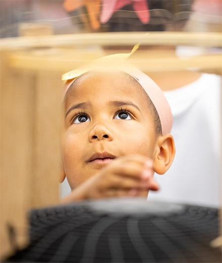 child looking up in wonder