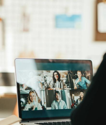 A woman chats on a video call. 