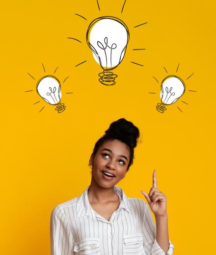 woman with lightbulbs above head
