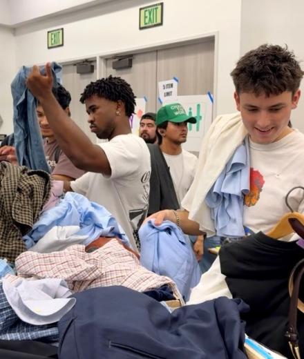 People trying on clothing