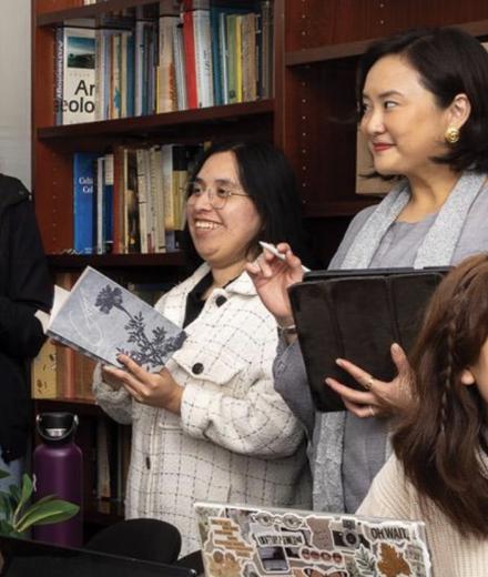 students around a table working