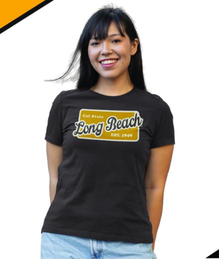 Girl wearing a brown shirt with Cal State Long Beach EST. 1949 on the front. 