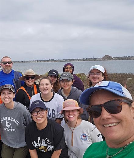Christine Whitcraft and student researchers in the field