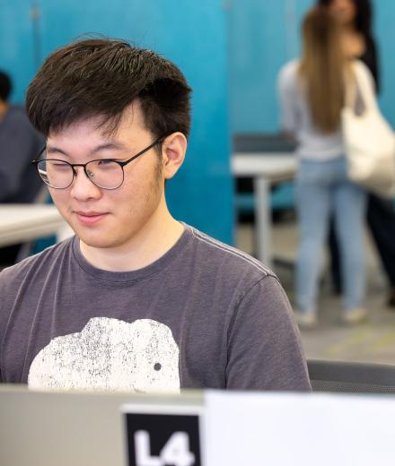 CSULB student Christopher Park with a VITA client