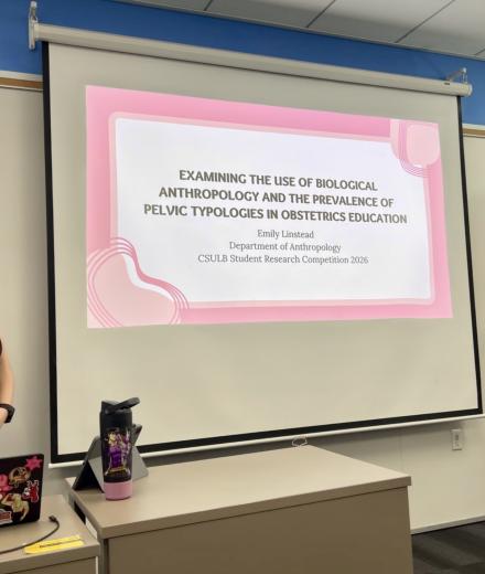 MA candidate presenting academic research.