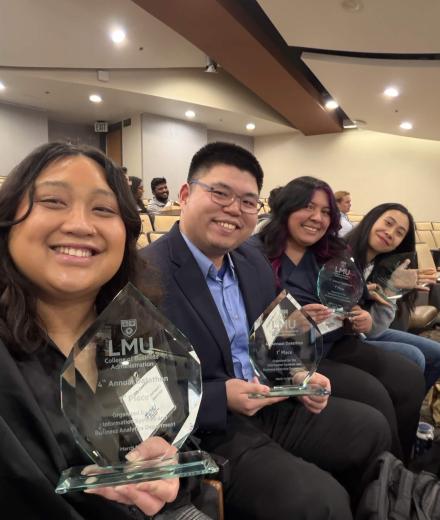 COB IS Abygail Caparoso, Timothy Tan, and Ha (Heather) Pham—took home first place at the 2026 LMU Datathon