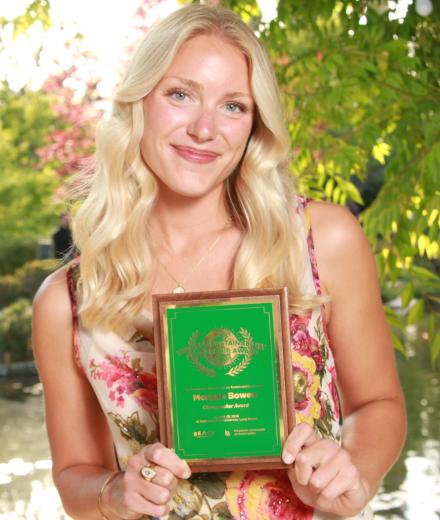 Morgan Bowen holding her award plaque