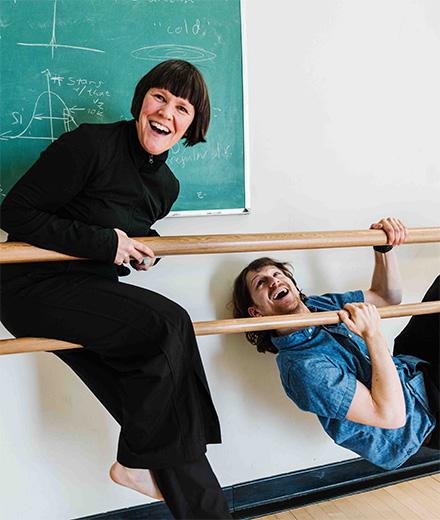 Rebecca Bryant and Joel Zinn having fun on ballet barres
