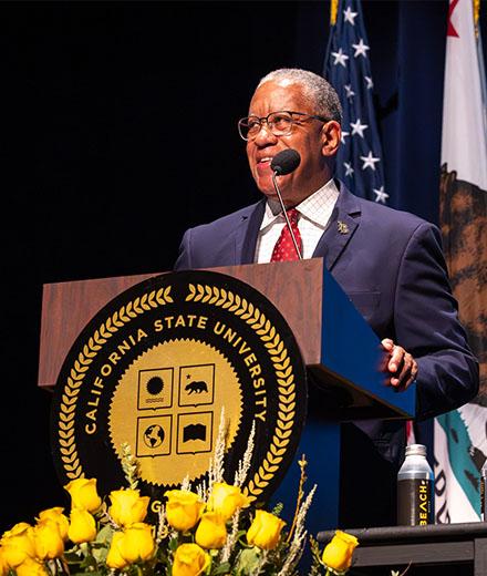 President Loren J. Blanchard speaks on the Carpenter Center stage