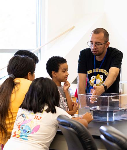 student teacher with young learners